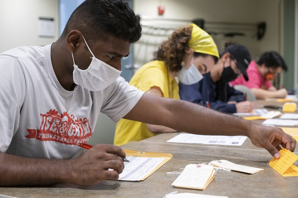 students fill out tags