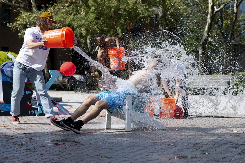 student getting splashed