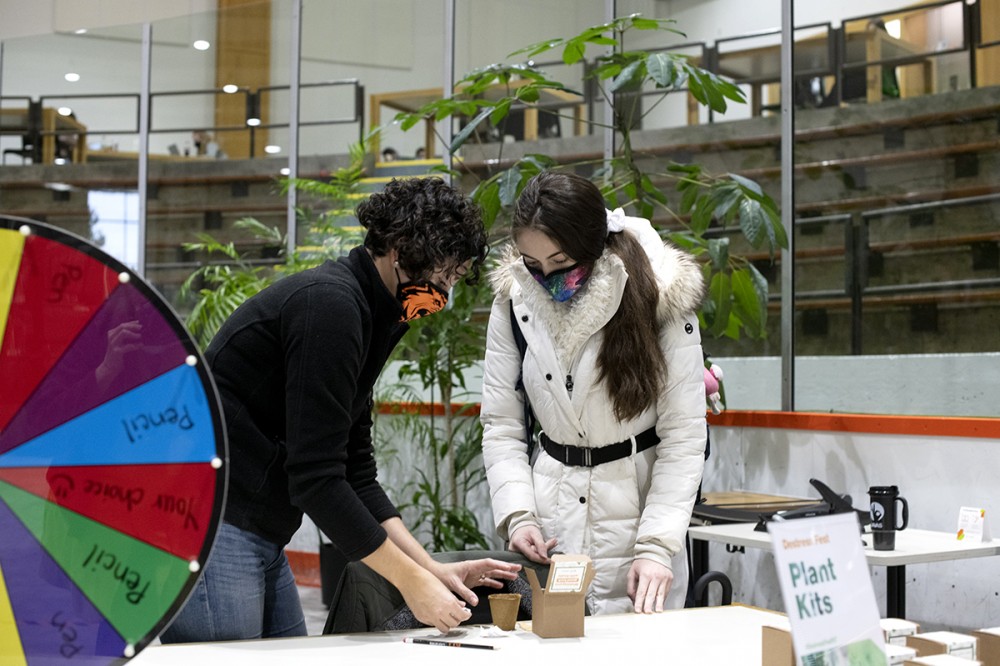 two women with plant kit