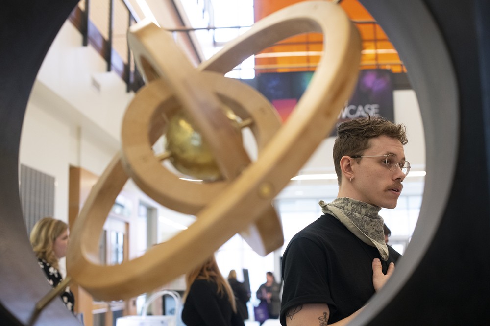 student with sculpture