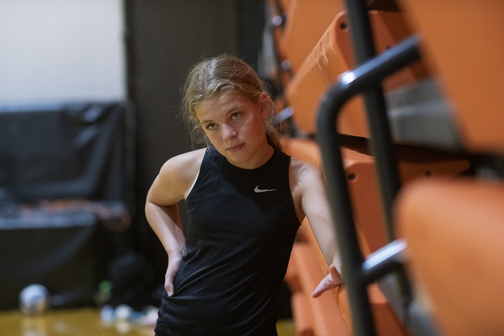 Girls all-skills volleyball camp took place on campus July 11-14. It was one of several summer sports camps this year. Here, seventh-grader Erin Kolodziej focuses on instruction during the camp.
<br><p>Photo by A. Sue Weisler</p>