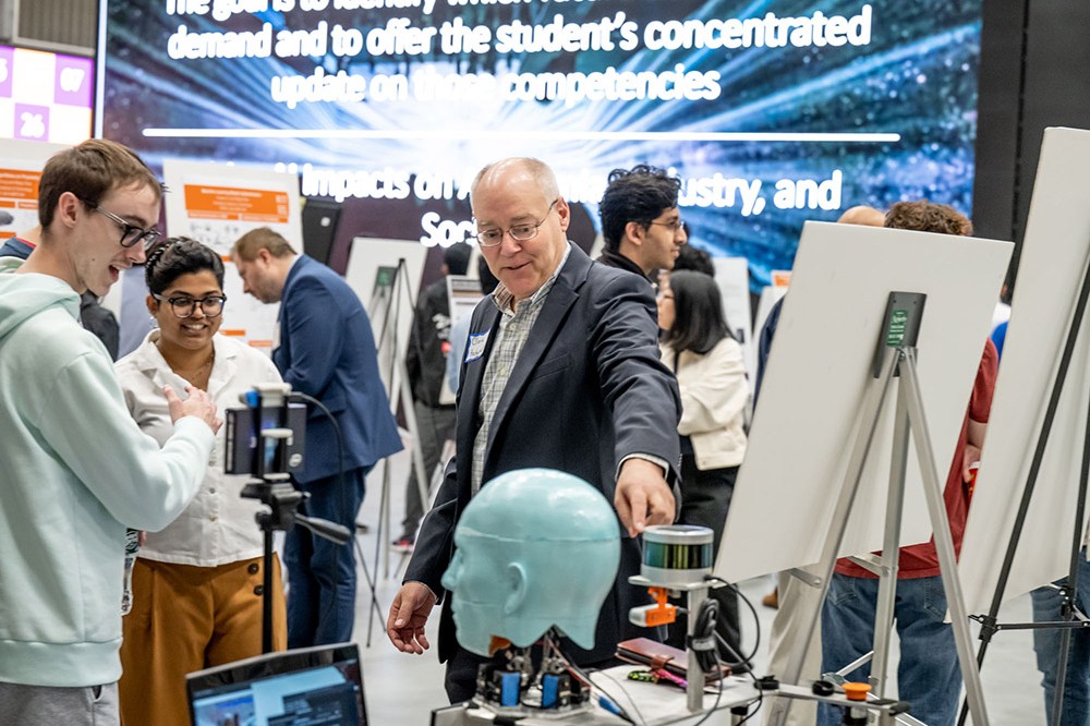 professor demonstrating artificial intelligence research.
