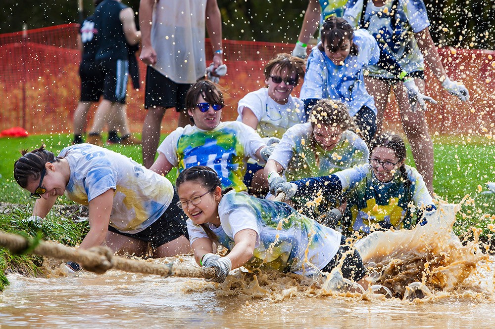 Front and center, Lucy Zhang, with the “Noot Noot” team, fights until the end to keep everyone above water during the 26th Annual Mud Tug at Grace Watson Hall and Grace Watson Fields. More than 1,000 students participated in the tug-of-war competition, which benefits the Hillside Family of Agencies and is organized by Zeta Tau Alpha sorority and Phi Kappa Psi fraternity.
<br><p>Photo by Carlos Ortiz</p>