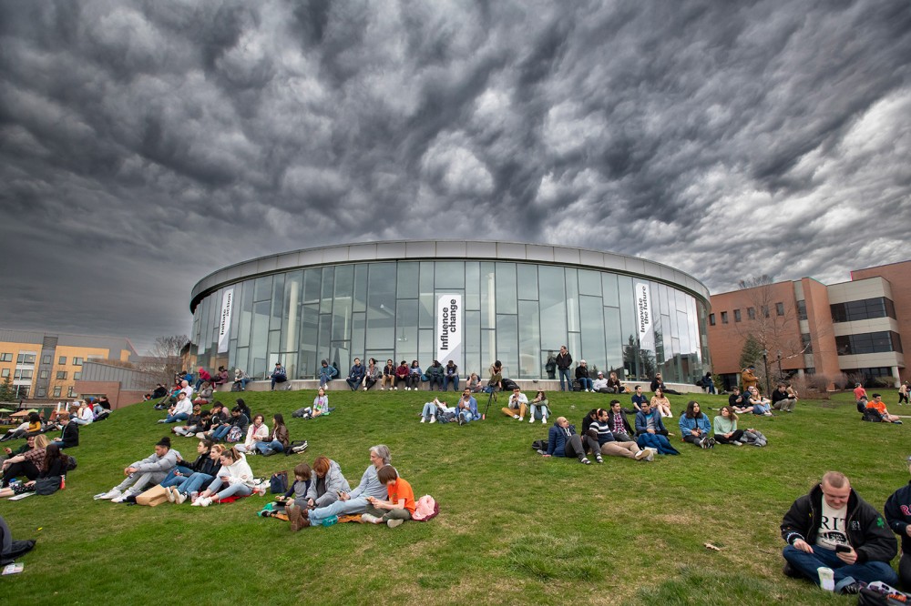 <p>Students, faculty, and staff stepped out for the total solar eclipse on April 8. In addition to viewing the eclipse, the RIT community enjoyed Eclipse Fest activities on campus including glow dodgeball, a neon dance party, and space-themed food.</p>

