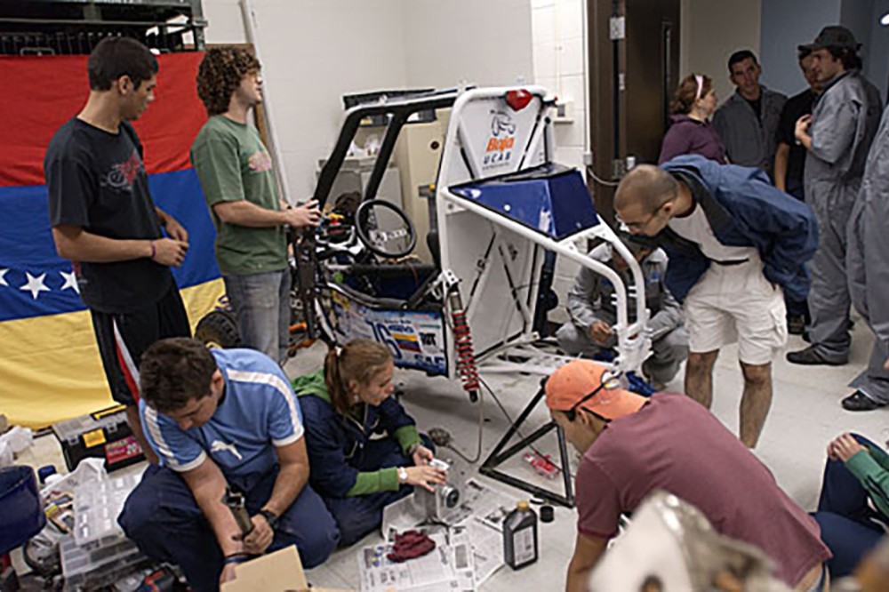 Students work on the Baja car