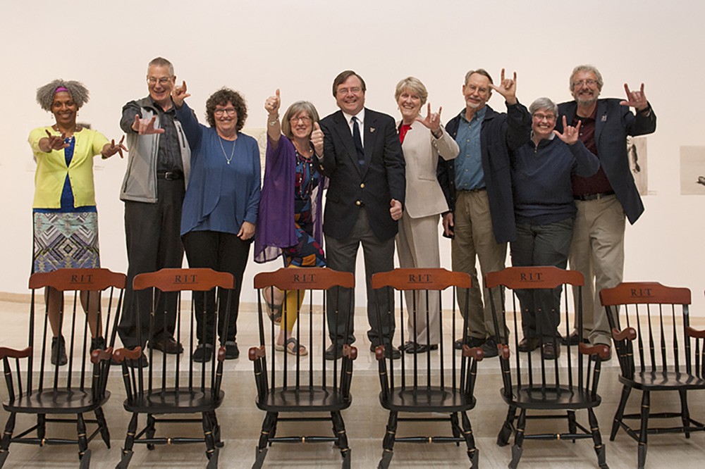 RITâs National Technical Institute for the Deaf celebrated the retirement of faculty and staff with NTID President Gerry Buckley at a ceremony on May 2. Signing âI love you,â from left to right, are Valarie Randleman, associate interpreter; Jeff Rubin, director, Substance &amp; Alcohol Intervention Services for the Deaf; Susan Foster, research faculty; Jeanette Tydings, senior staff assistant; Buckley; Mary Beth Parker, instructional/support faculty; Michael Stinson, research faculty; Abie Abrams, associate interpreter; and John Panara, instructional/support faculty.