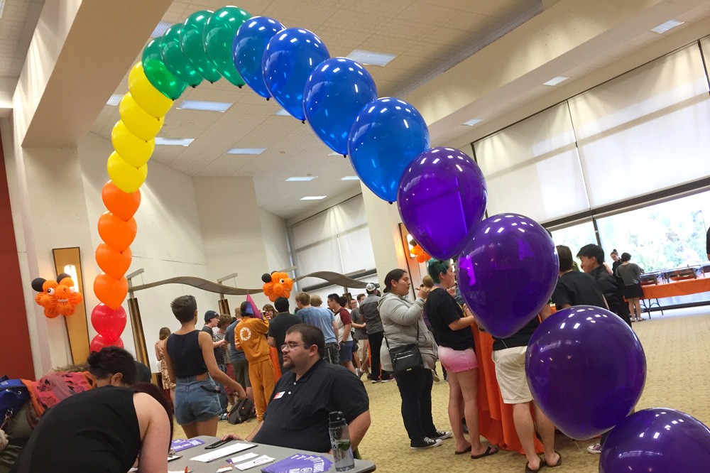 Daniel Greenebaum, a graduate assistant at the RIT Q Center, greeted students at the Rainbow Welcome Picnic on August 27.