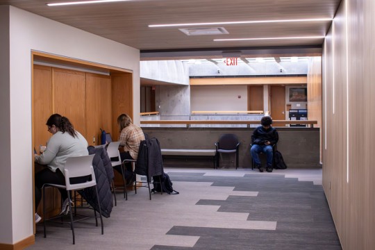 students studying in a small common area.