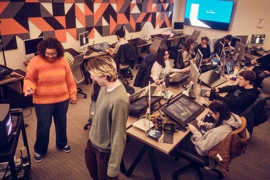 design class working in a computer lab.