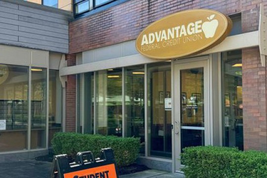 Front facing view of the Advantage F C U building in Global Village.