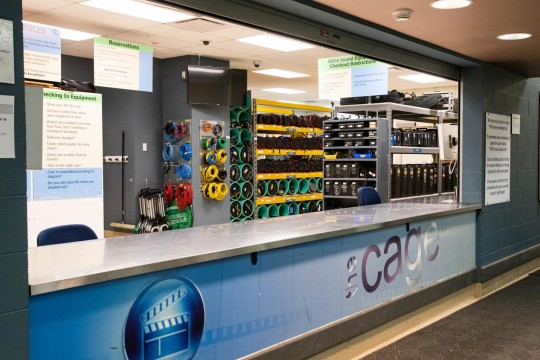 Counter of the Cage with shelves of supplies neatly organized