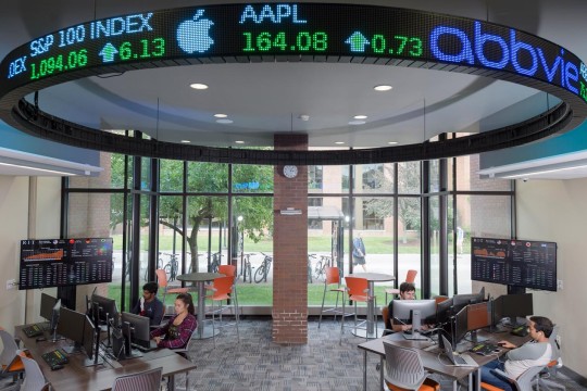 Stock lab with a circular stock ticker on the ceiling