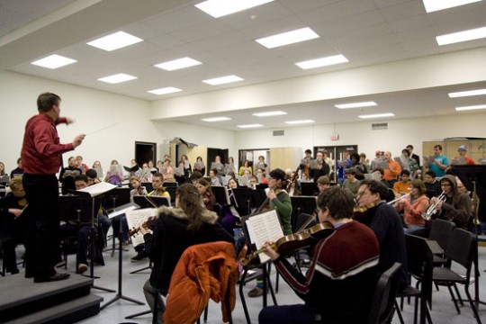 Musicians practicing in room