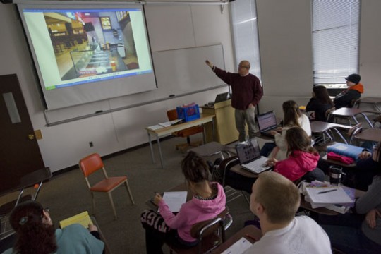 Professor teaching in classroom
