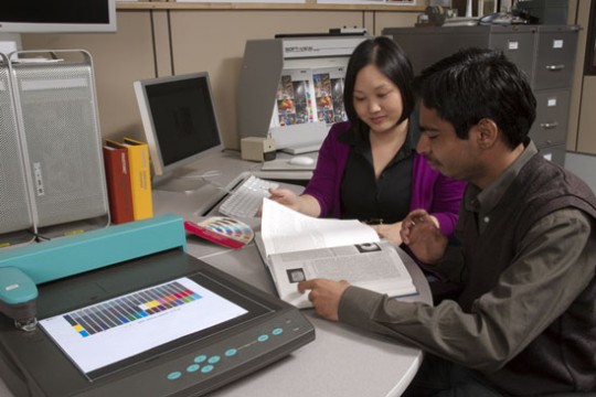 People reading textbook