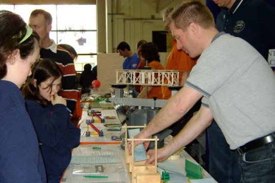 People building at event 