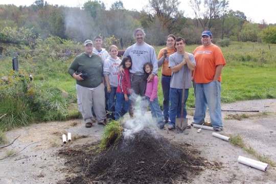 People standing near fire pit
