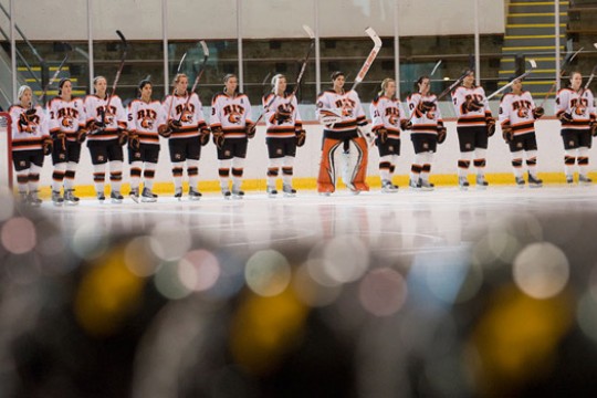 Pictures Hockey players lined up on rink
