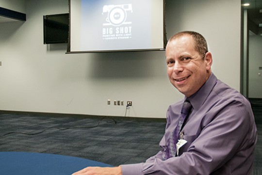 Person posing for camera in lobby