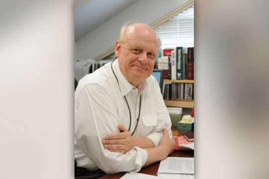 Professor posing for camera