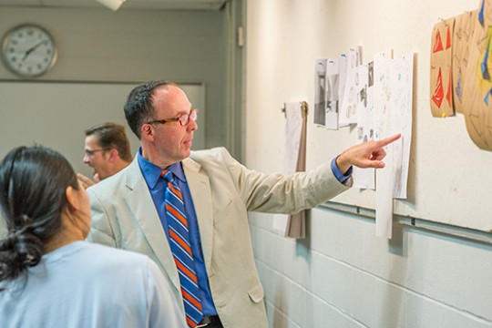 Professor explaining project