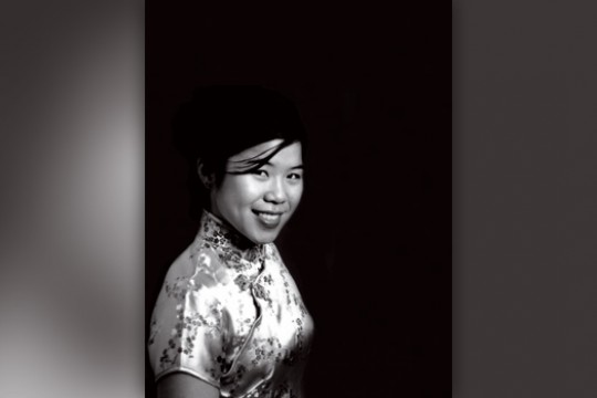 Black and white portrait of Anna Leung.