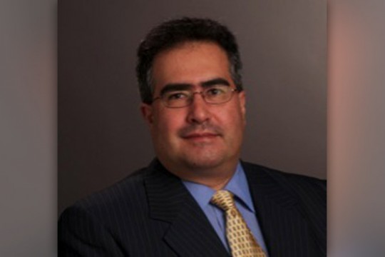 Professor posing for camera