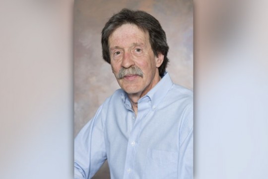 Professor posing for camera