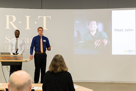 Person speaking to classroom of people