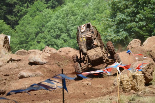 Picture of kart driving along dirt course