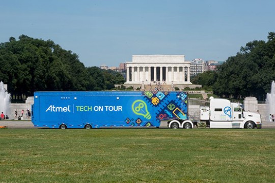 Bus parked in front of monument 