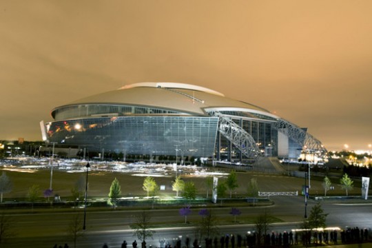 Picture of stadium lit up at night