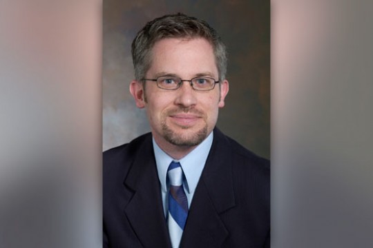 Professor posing for camera