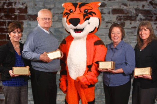 People gathered with mascot