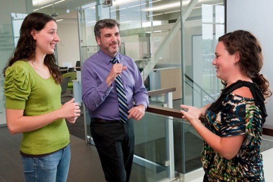 People talking in hallway