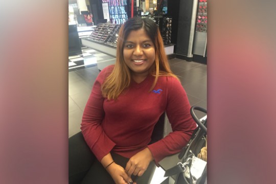 Person posing for camera in store