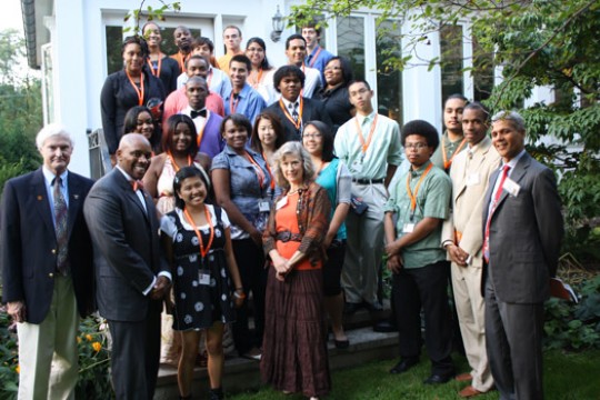 People posing for camera at event