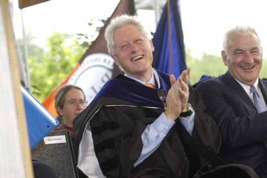 Bill Clinton laughing at graduation