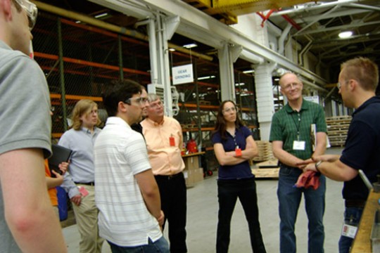 People talking in warehouse