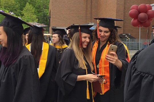 Graduates taking pictures