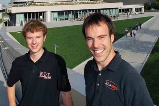 People posing for camera