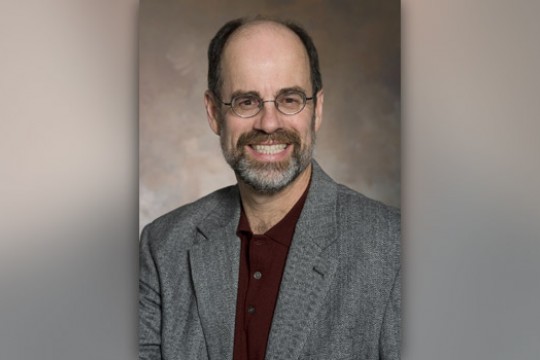 Professor posing for camera