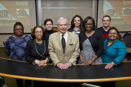 People posing at event