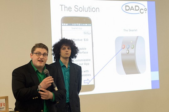Students pitching business idea at Investor Demo Night
