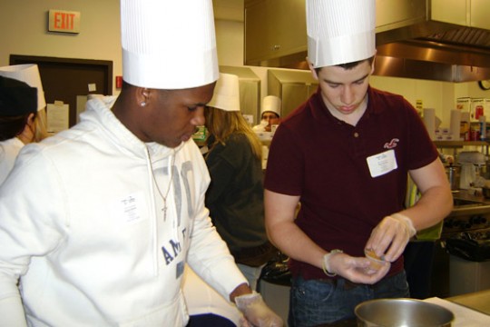People cooking in kitchen