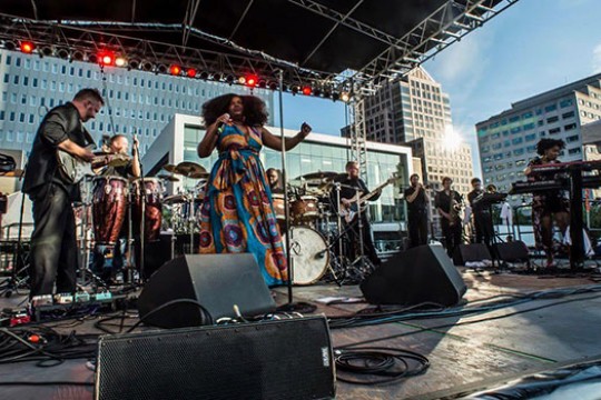 Rochester soul band Danielle Ponder and the Tomorrow People performing on stage.