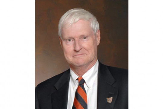 RIT President posing for camera