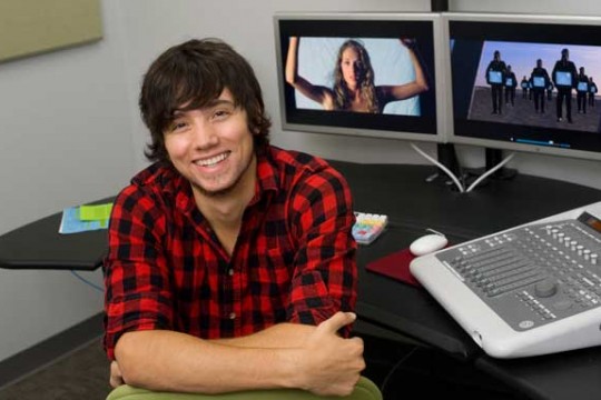 Picture of student in front of desk
