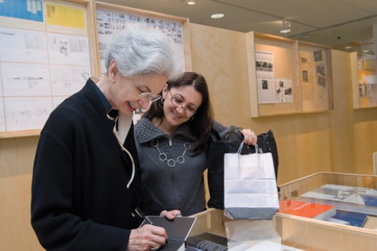 Person signing books