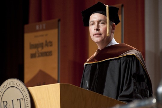 Person giving speech at podium
